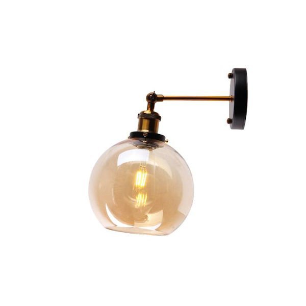 Antique style wall light with an amber tinted glass shade