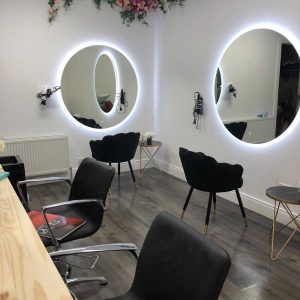salon with large round mirrors