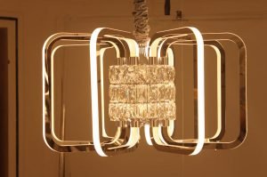 modern LED light with mirrored arms