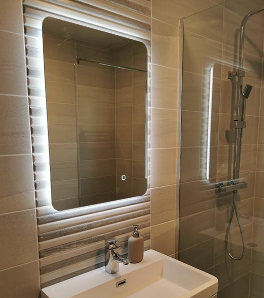 500x700mm bathroom mirror hanging above sink in en-suite