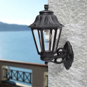 black lantern style wall light fixed to an exterior wall