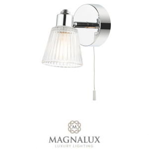 single wall light with chrome features and clear ribbed glass shade in the shape of a pyramid