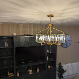 Golden Crystal Chandelier Illuminating a living room